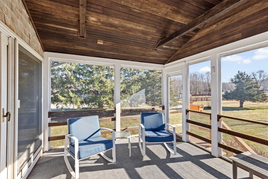 131 Free Street Hingham, MA 02043 - Photo 26 of 39 a view of a room with outdoor seating wooden floor and a large window