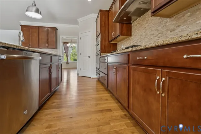 a hallway with wooden cabinets