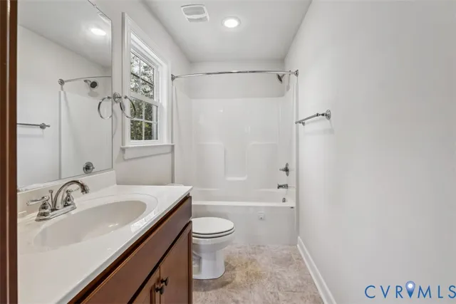 a bathroom with a sink toilet tub and shower