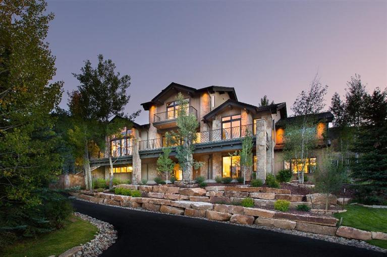 184 Arrowhead Drive Edwards, CO 81632 - Photo 1 of 23 a view of a big building with large windows and a small yard