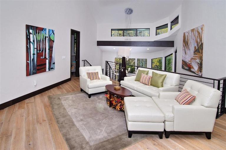 184 Arrowhead Drive Edwards, CO 81632 - Photo 12 of 23 a living room with furniture and a painting on the wall