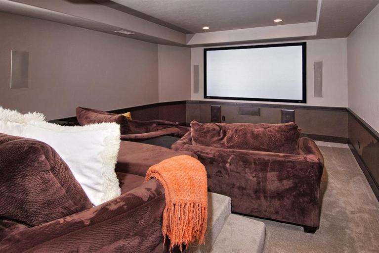 184 Arrowhead Drive Edwards, CO 81632 - Photo 22 of 23 a projector room with a bed and couch