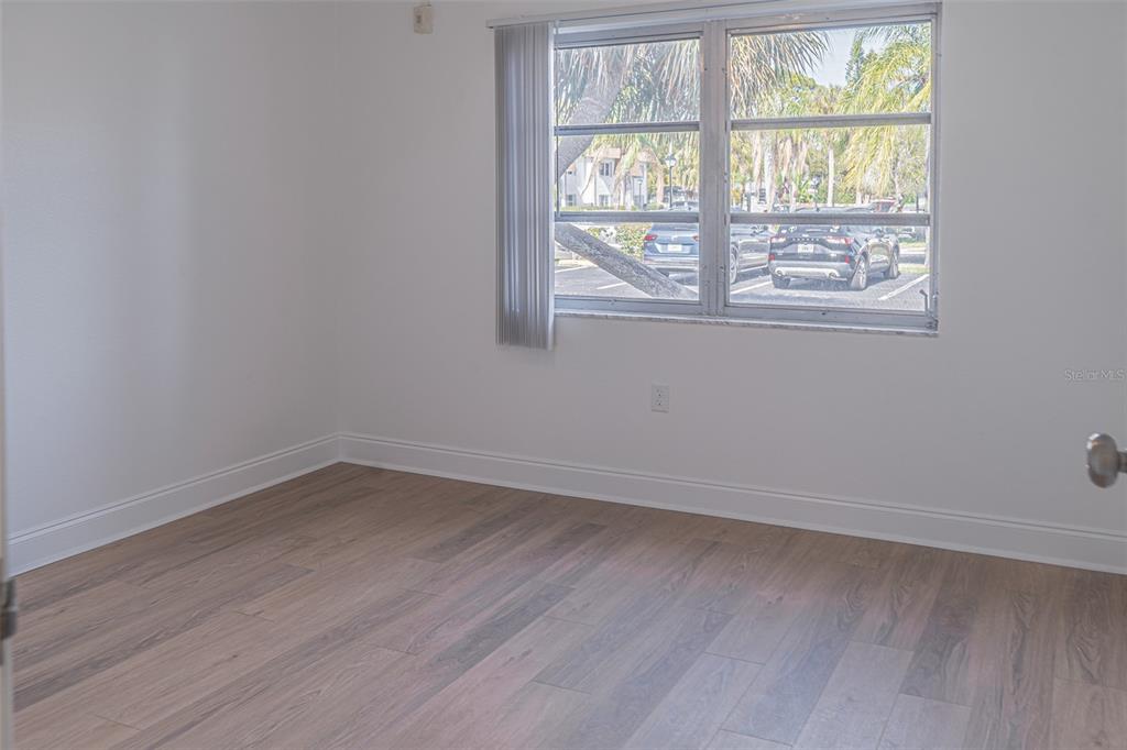 363 South McMullen Booth Road, Unit 107 Clearwater, FL 33759 - Photo 12 of 21 an empty room with a window