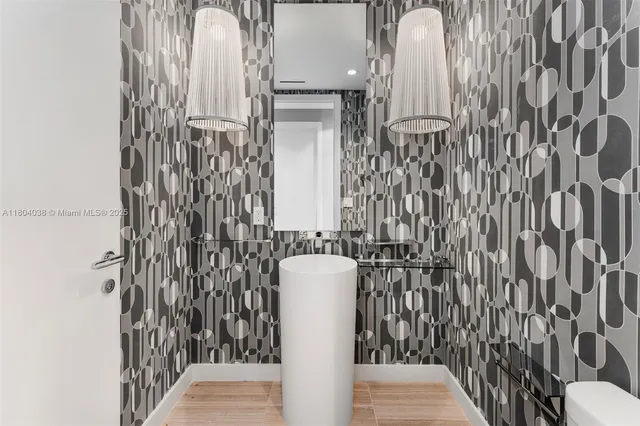 a living room with furniture and a book shelf