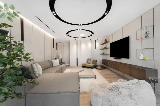 a living room with furniture and a table