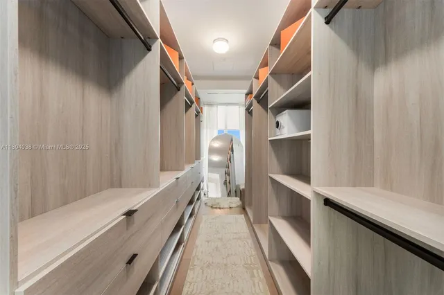 a bedroom with bed and window