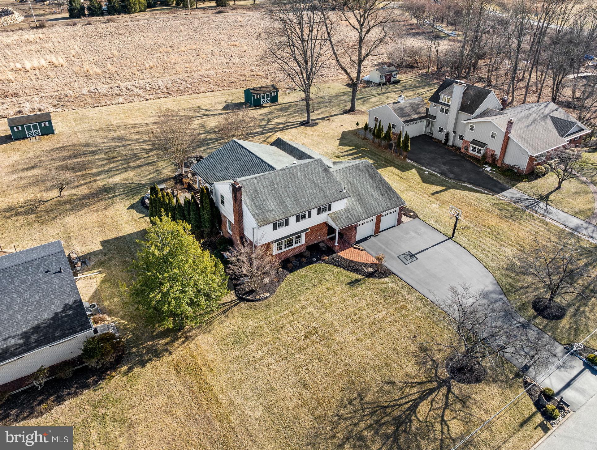 a view of a backyard of the house