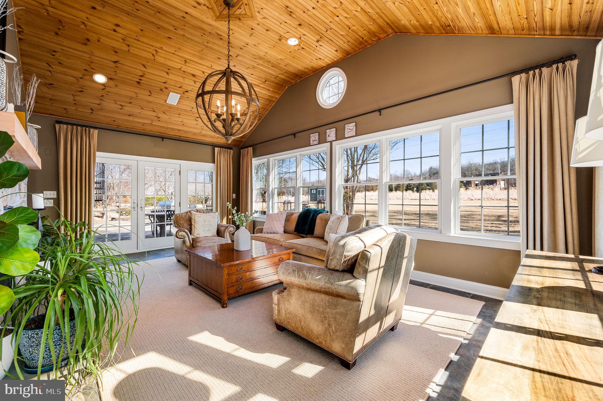 342 Old State Road Berwyn, PA 19312 - Photo 24 of 58 a living room with furniture and a large window