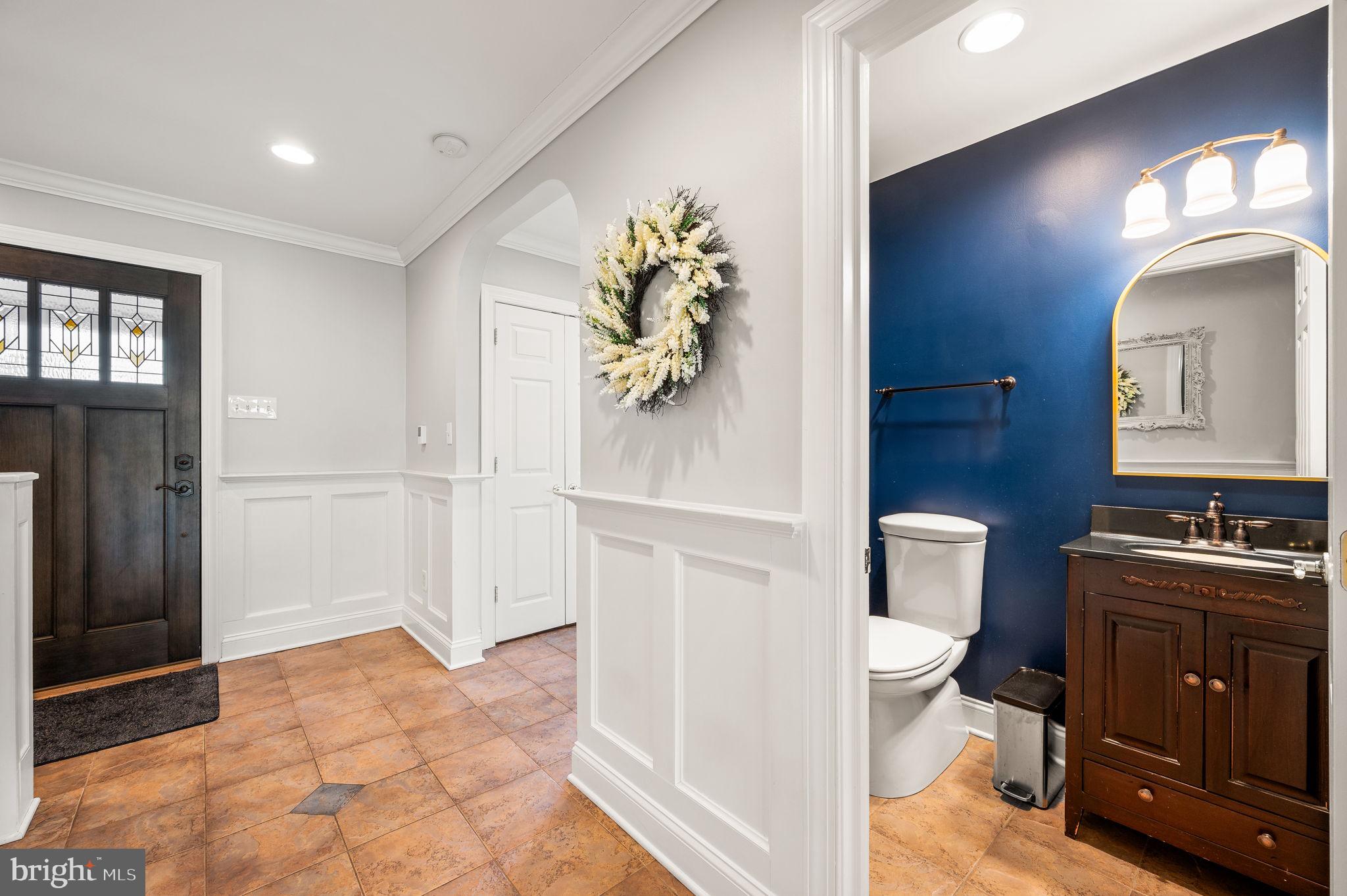 342 Old State Road Berwyn, PA 19312 - Photo 5 of 58 Half bath off the foyer & radiant heat floors