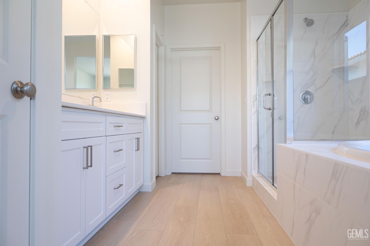 Undisclosed Address Bakersfield, CA 93311 - Photo 11 of 29 a view of a bathroom with mirror and window