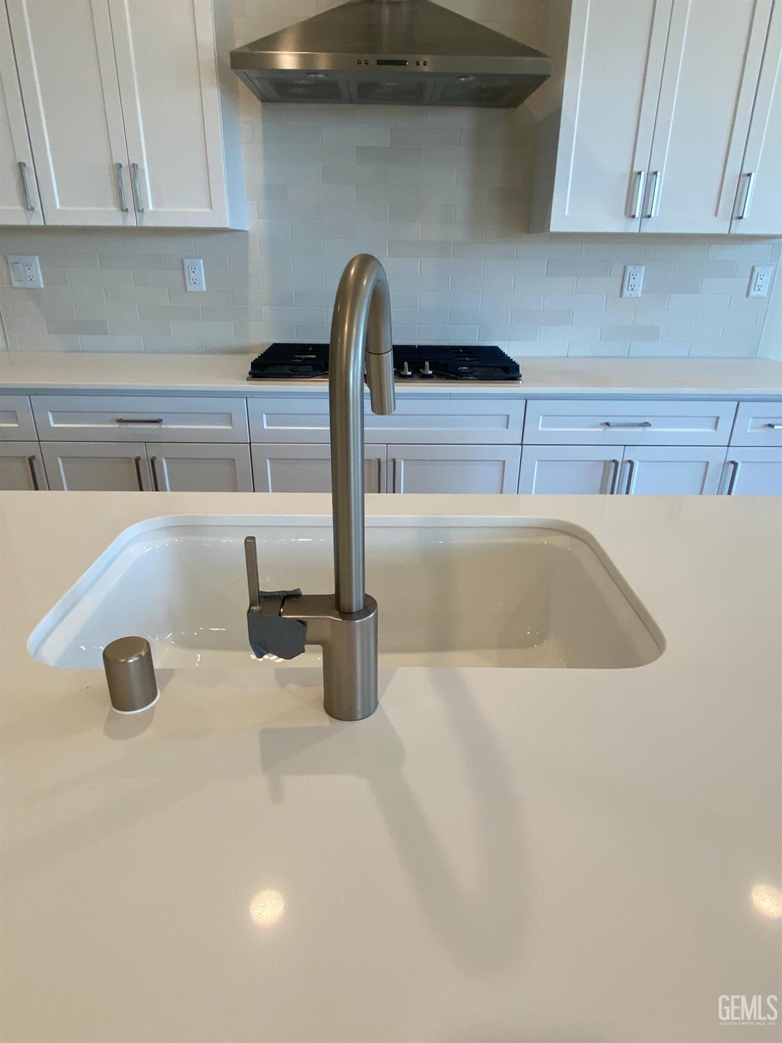 Undisclosed Address Bakersfield, CA 93311 - Photo 15 of 29 a kitchen with a sink and a window