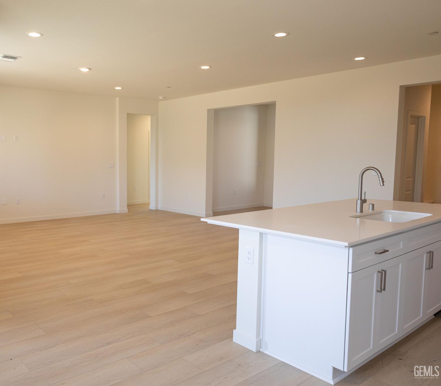 Undisclosed Address Bakersfield, CA 93311 - Photo 8 of 29 a view of a bathroom with a sink and a mirror