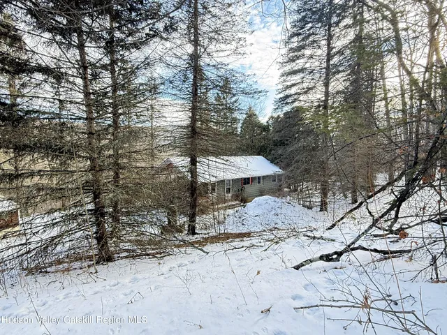 a room that has a dresser in it