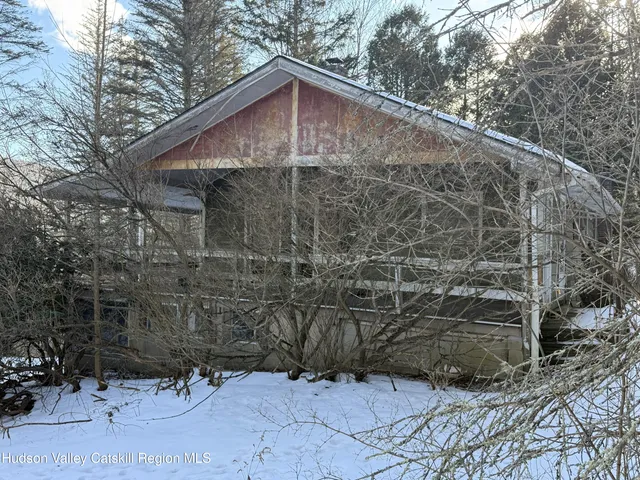 a wooden fence and trees