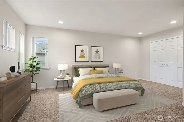 a bedroom with a bed and hallway