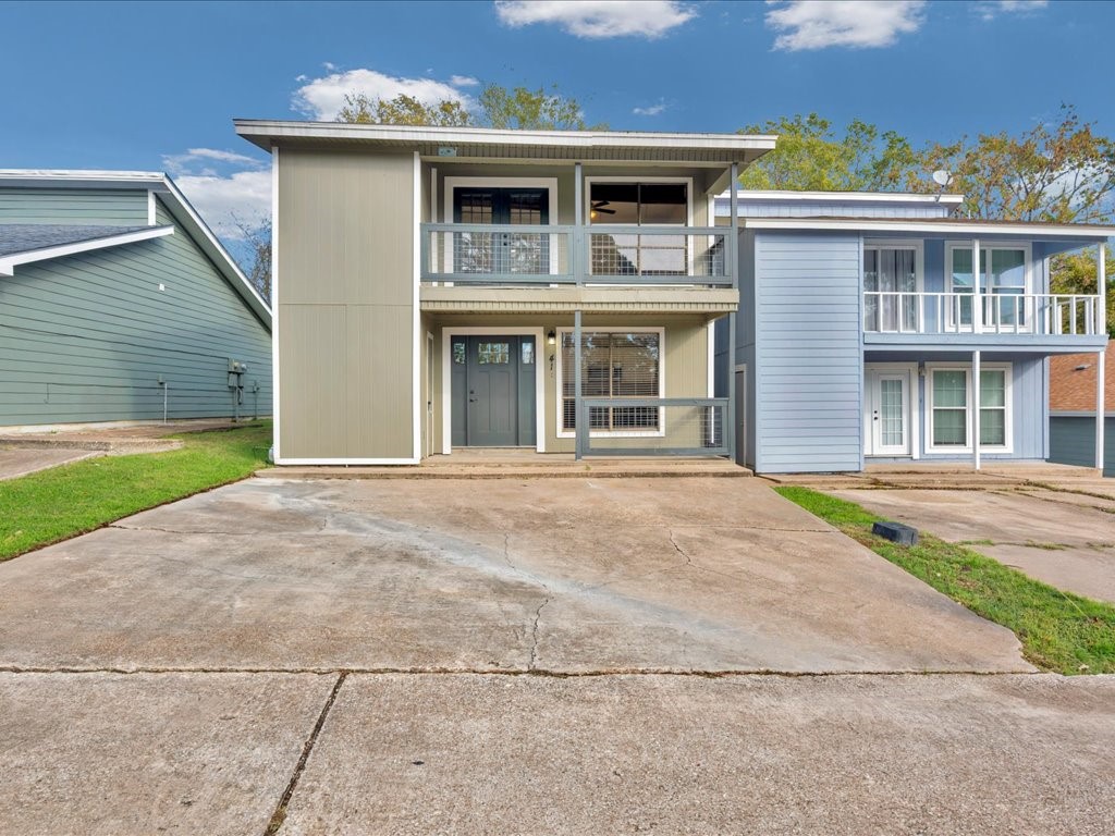 41 Harbour Row Drive Coldspring, TX 77331 - Photo 1 of 36 a front view of a house with a yard and garage