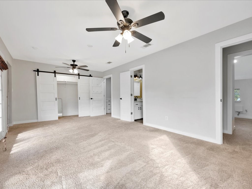 41 Harbour Row Drive Coldspring, TX 77331 - Photo 26 of 36 an empty room with fan and a ceiling fan