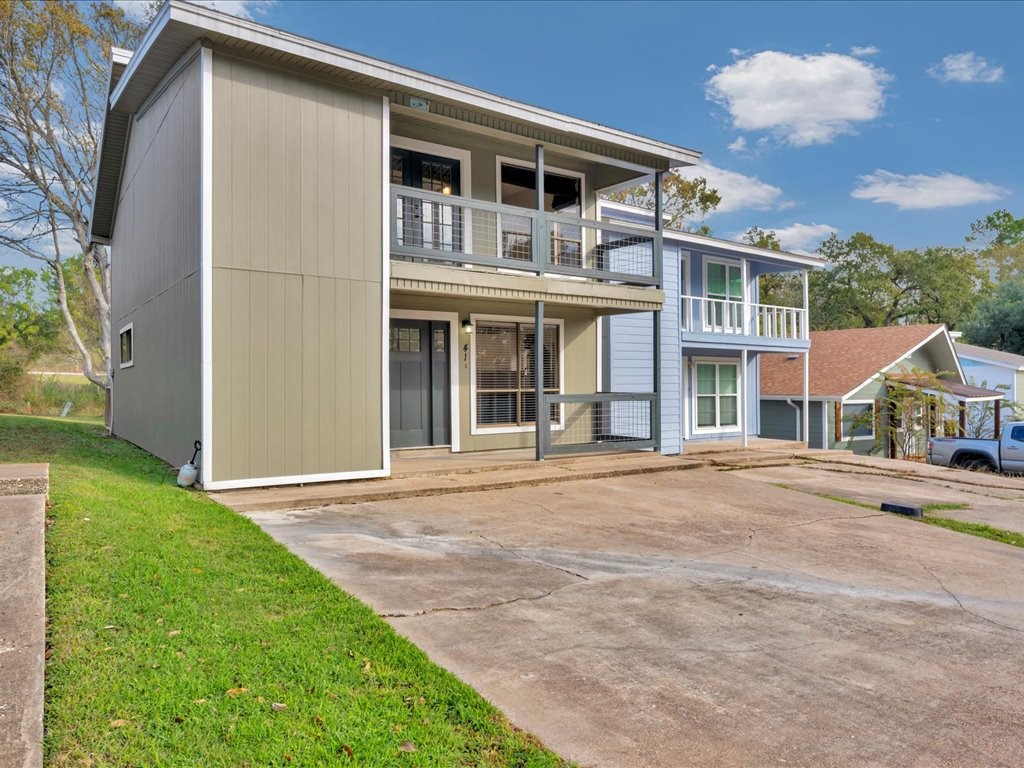 41 Harbour Row Drive Coldspring, TX 77331 - Photo 36 of 36 a front view of a house with a garden