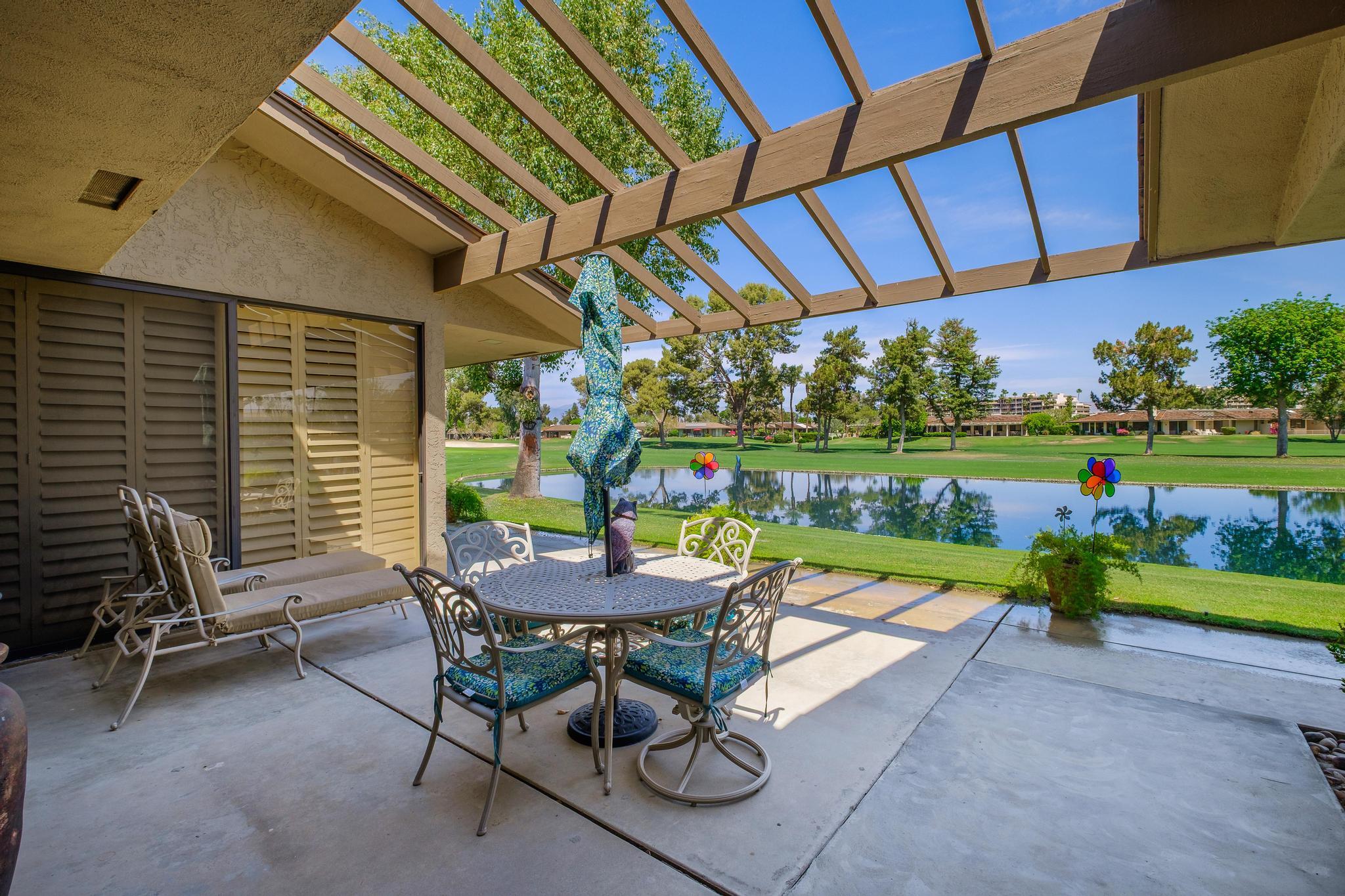 30 Columbia Drive Rancho Mirage, CA 92270 - Photo 11 of 49 a view of backyard with swimming pool and outdoor seating