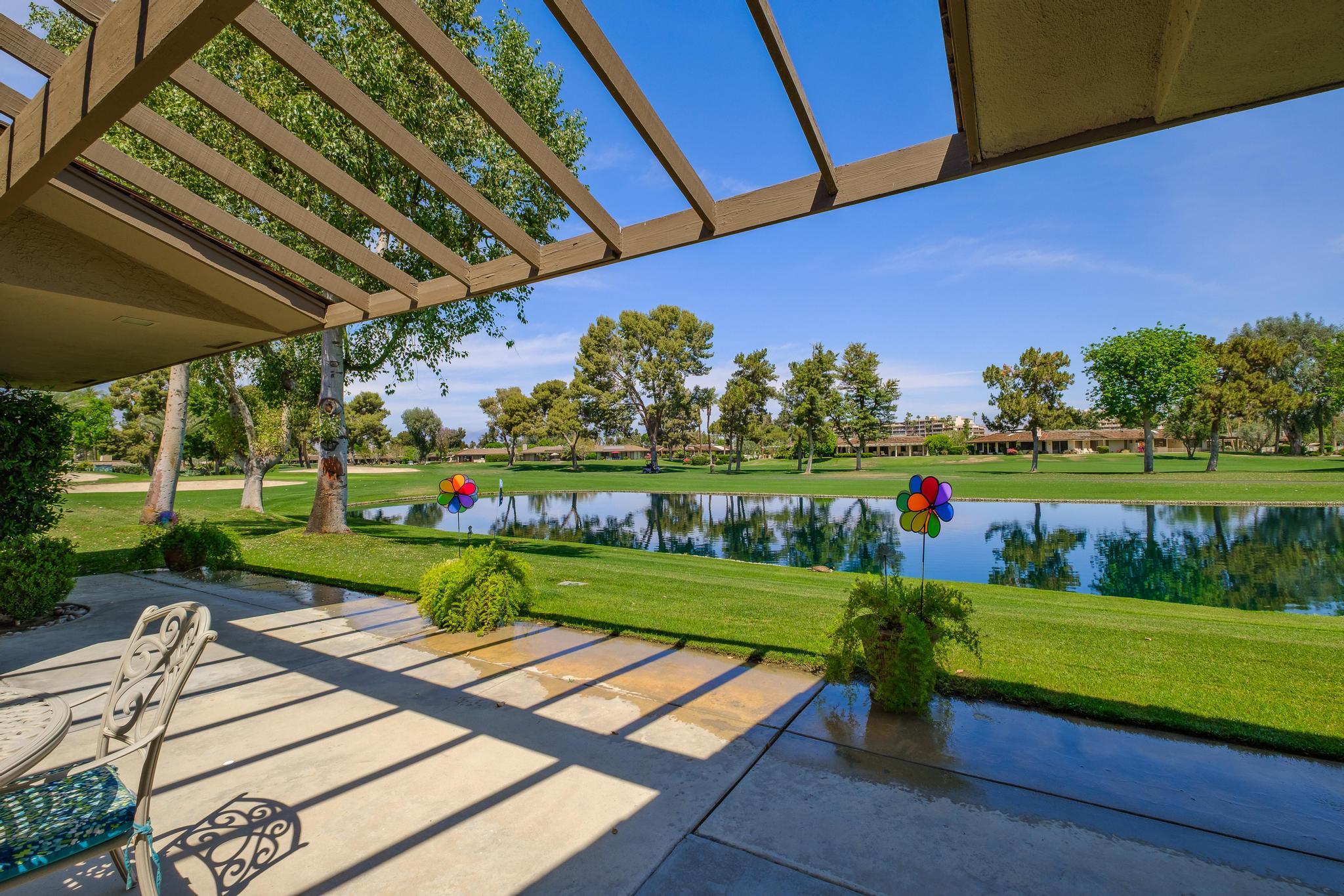 30 Columbia Drive Rancho Mirage, CA 92270 - Photo 13 of 49 a view of yard with outdoor seating and green space