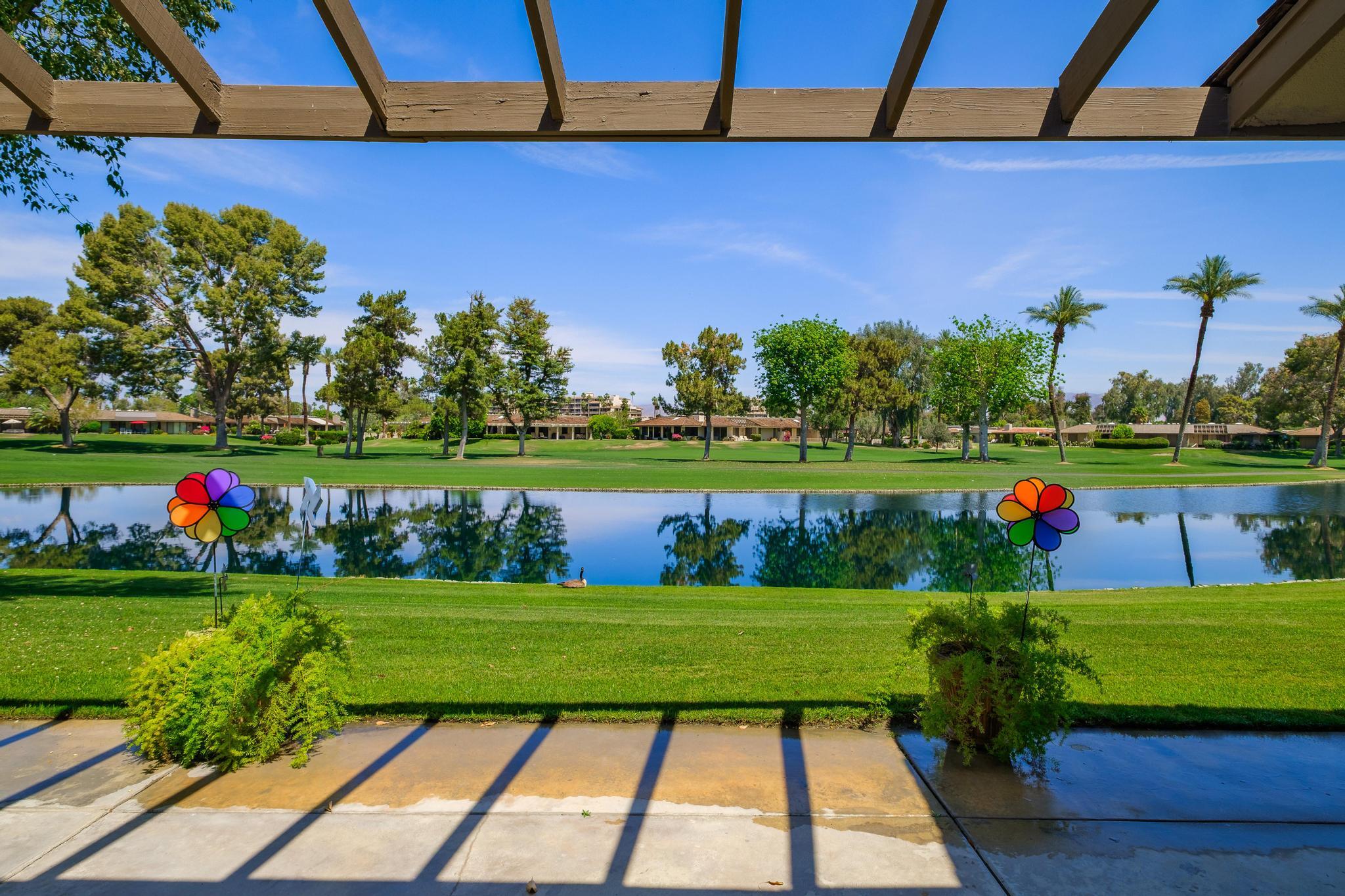 30 Columbia Drive Rancho Mirage, CA 92270 - Photo 14 of 49 a view of a park with large trees