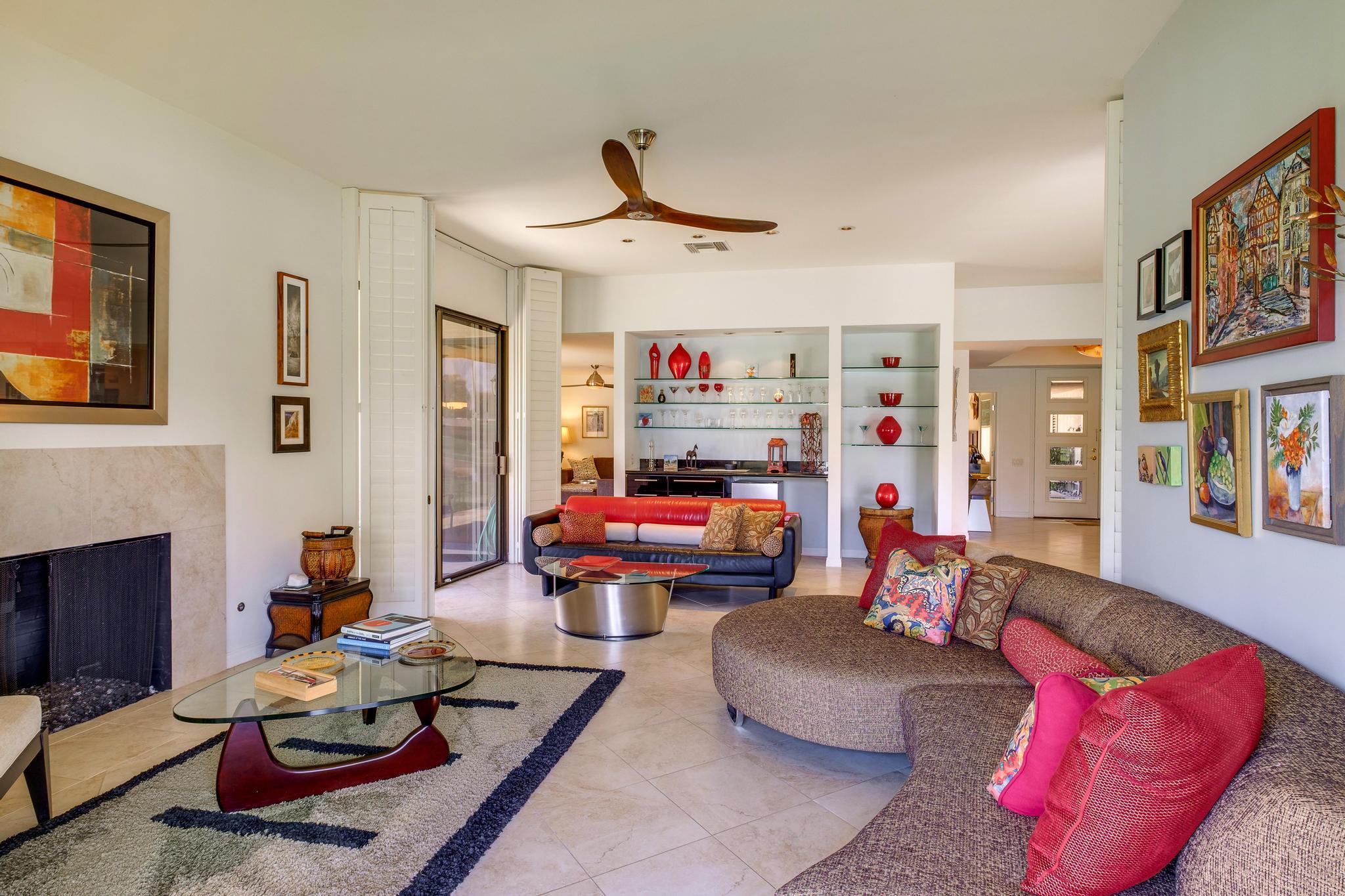 30 Columbia Drive Rancho Mirage, CA 92270 - Photo 15 of 49 a living room with furniture and a fireplace