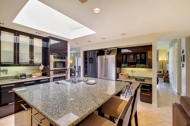 a bathroom with a shower and toilet