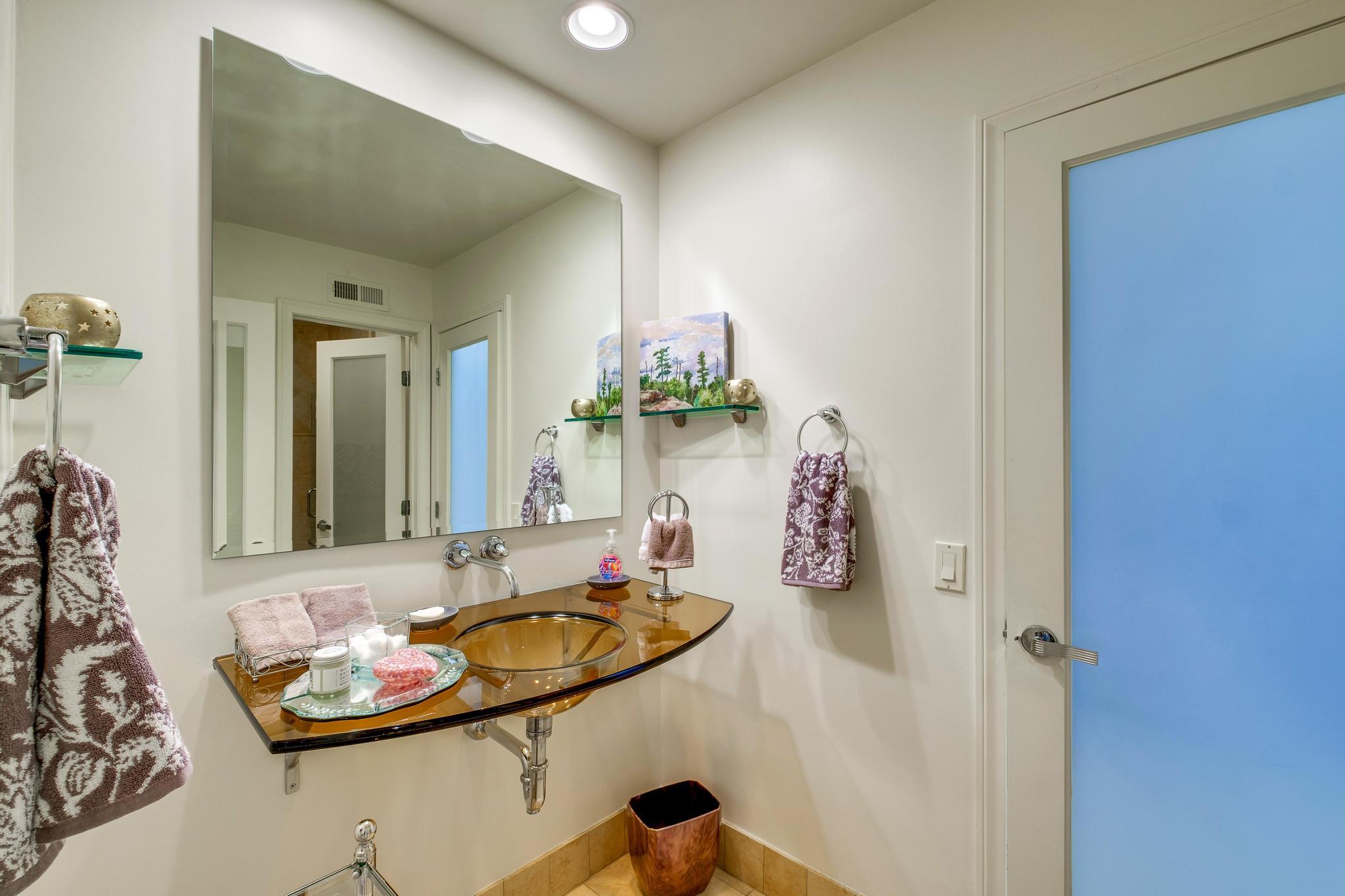 30 Columbia Drive Rancho Mirage, CA 92270 - Photo 34 of 49 a bathroom with a sink and a mirror