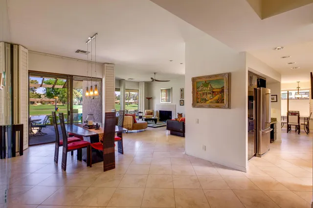 a view of yard with outdoor seating and green space