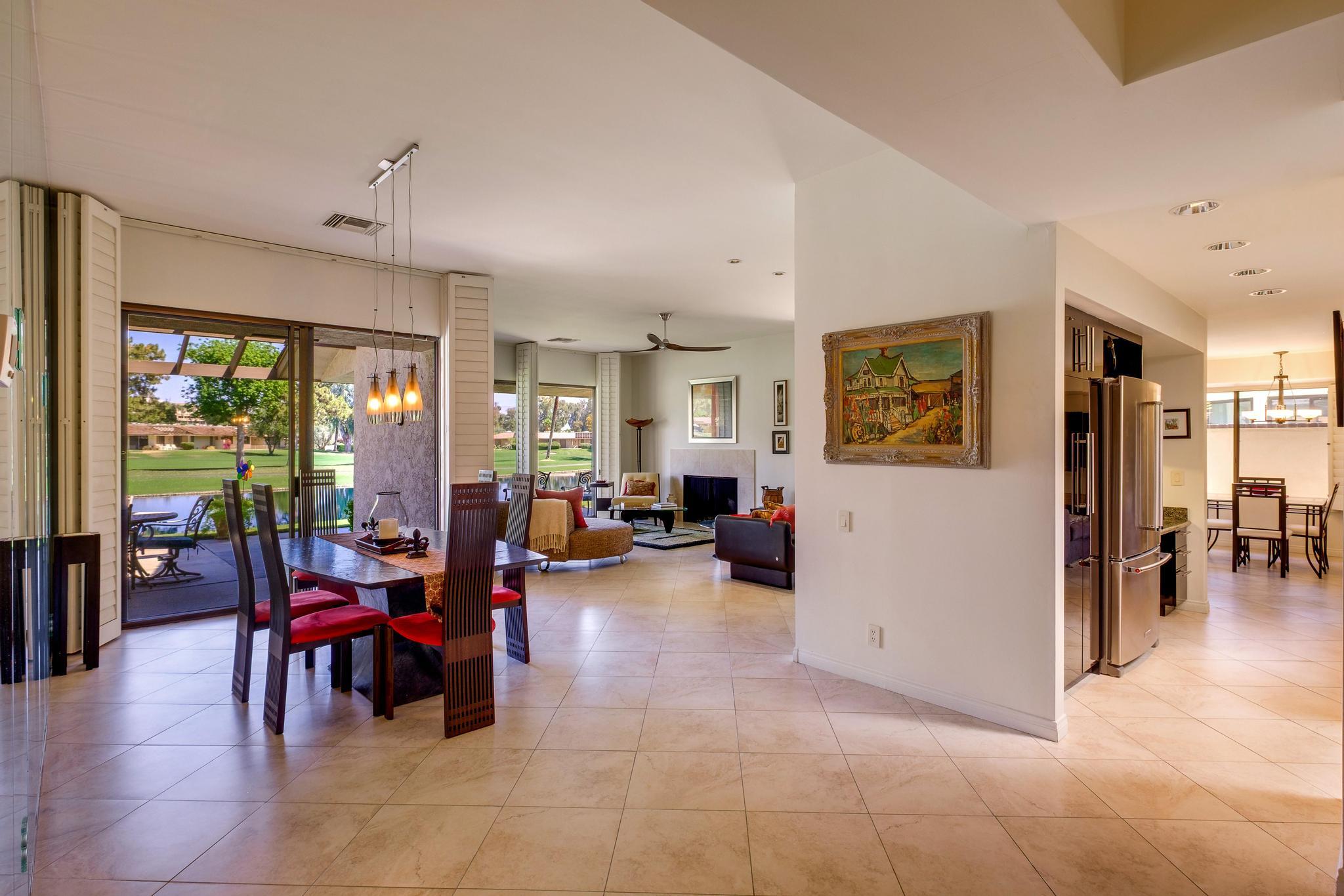 30 Columbia Drive Rancho Mirage, CA 92270 - Photo 8 of 49 a living room with furniture and a large window