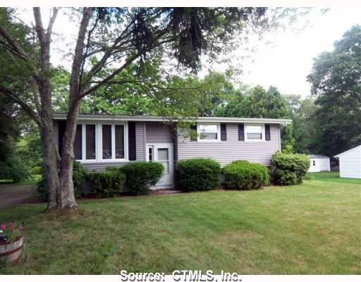 9 Town Farm Road Ledyard, CT 06339 - Photo 1 of 1 a view of a house with backyard and garden
