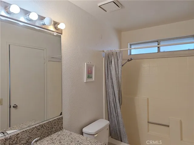 a view of a utility room with dryer and washer