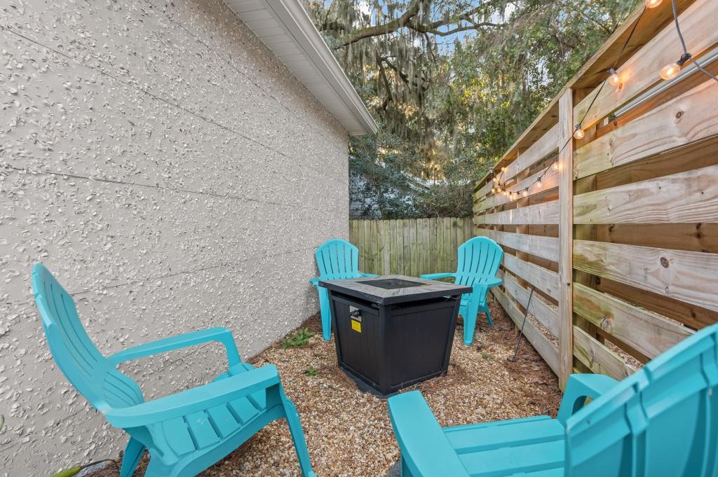 423 Palmetto Street St. Simons, GA 31522 - Photo 25 of 38 a view of outdoor sitting area with furniture