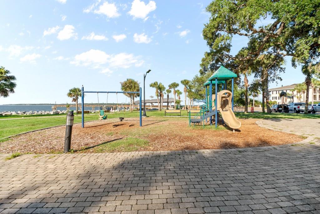 423 Palmetto Street St. Simons, GA 31522 - Photo 33 of 38 a view of a park with swings
