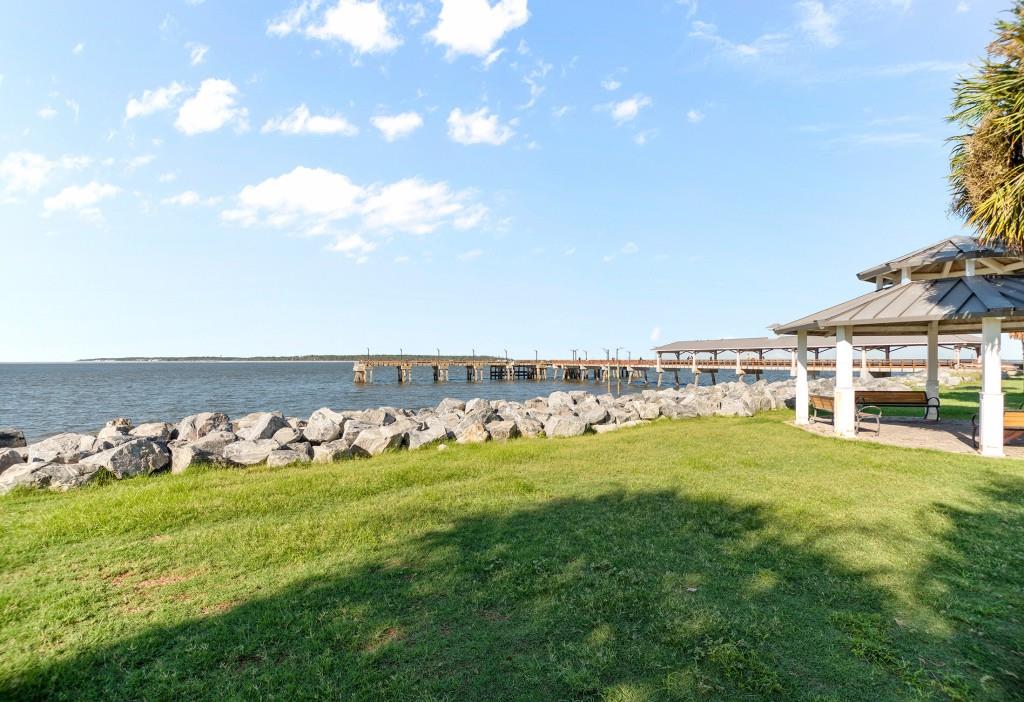 423 Palmetto Street St. Simons, GA 31522 - Photo 34 of 38 a view of a lake with houses