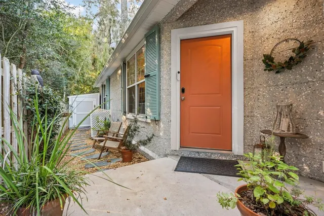 a view of backyard with patio