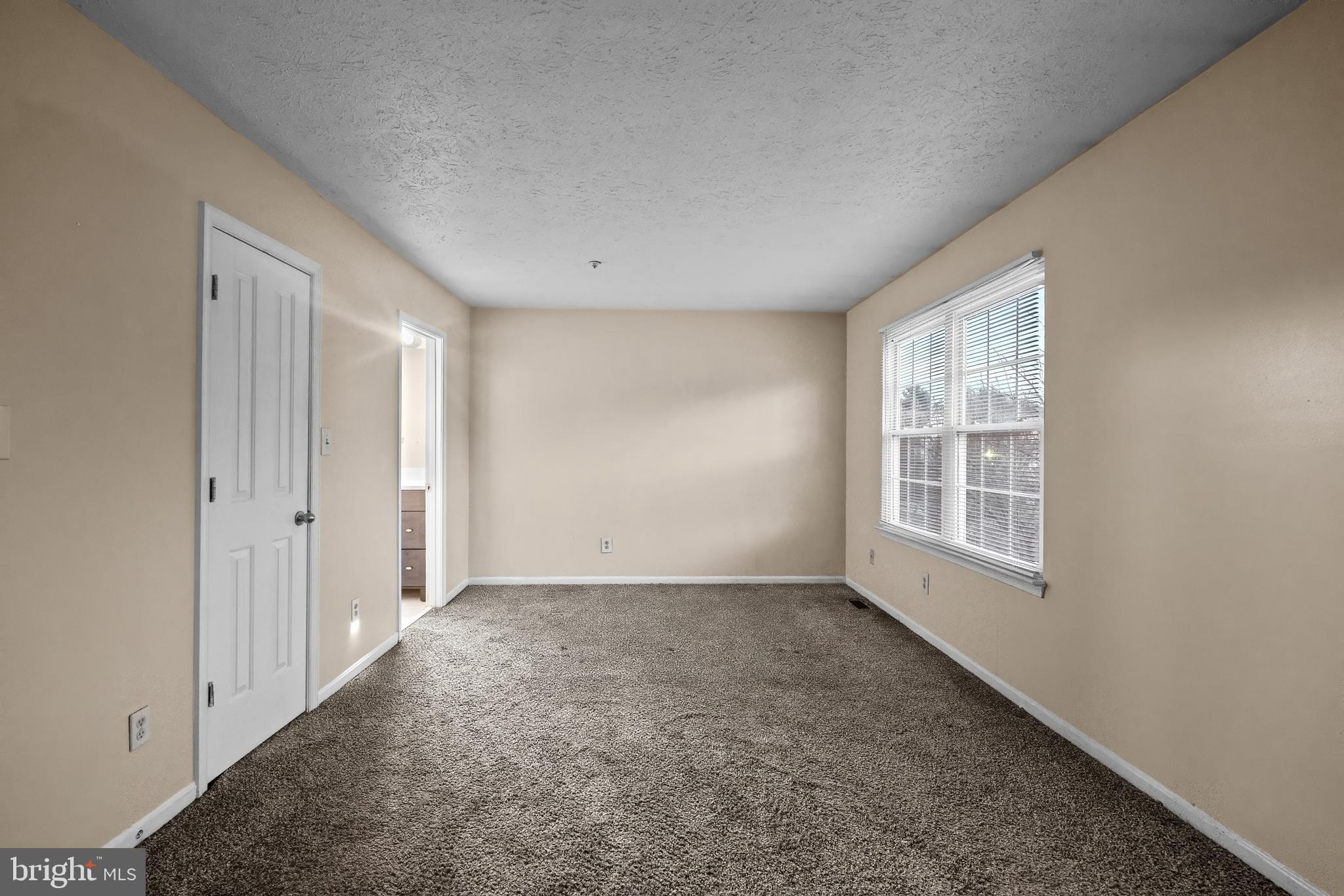 4313 Star Circle Randallstown, MD 21133 - Photo 10 of 21 an empty room with windows
