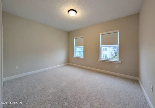 a view of a golf course with a yard