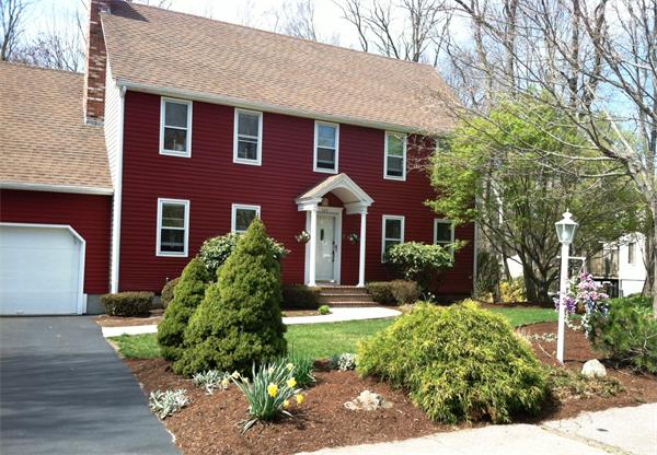149 Hampton Road Sharon, MA 02067 - Photo 1 of 15 a front view of a house with garden