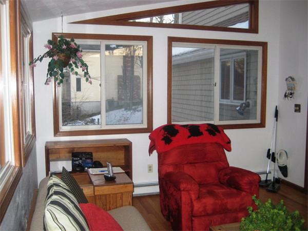 149 Hampton Road Sharon, MA 02067 - Photo 5 of 15 a living room with furniture and a large window