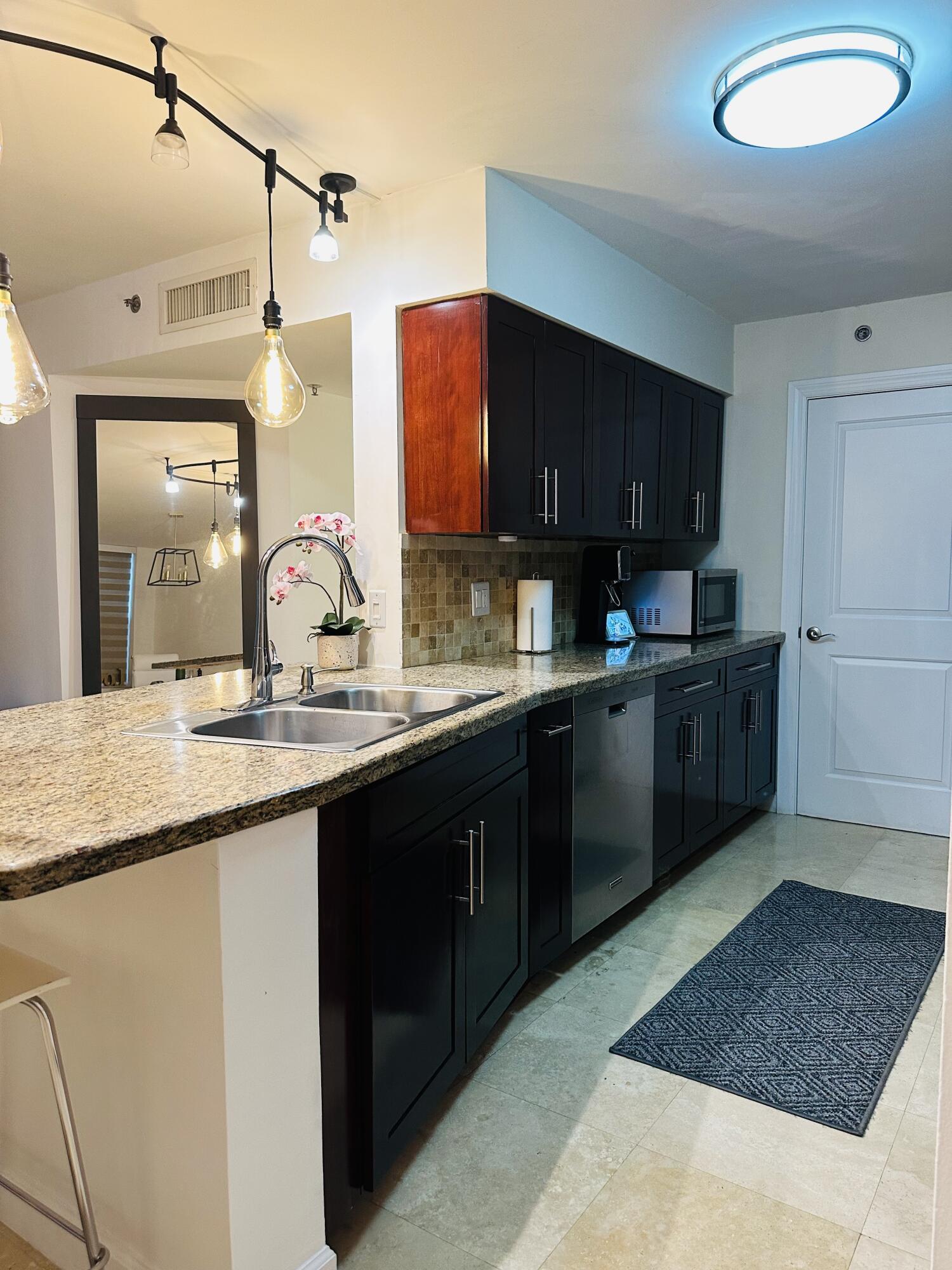 3153 Clint Moore Road, Unit 102 Boca Raton, FL 33496 - Photo 2 of 21 5747CF51-5884-4AFA-852E-CF1C059817DD_1_2