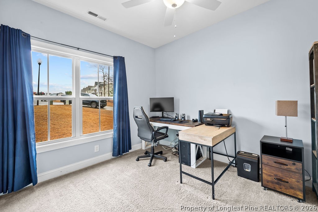 405 Turriff Way Cameron, NC 28326 - Photo 17 of 43 a workspace with furniture and a window