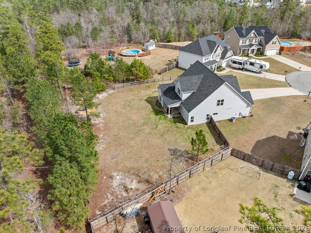 405 Turriff Way Cameron, NC 28326 - Photo 35 of 43 an aerial view of a swimming pool with outdoor seating
