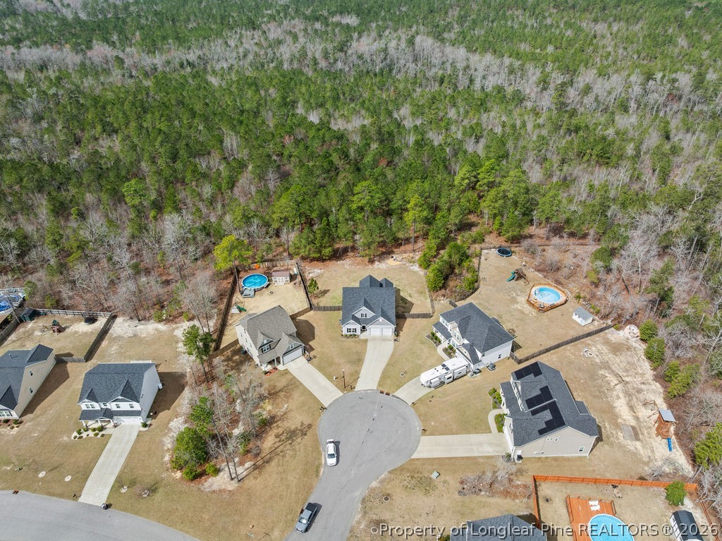 405 Turriff Way Cameron, NC 28326 - Photo 38 of 43 an aerial view of a house with backyard