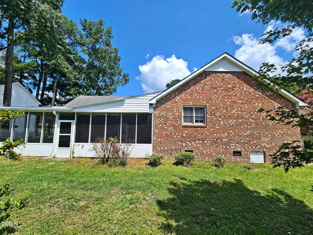 a garden with a flower in it