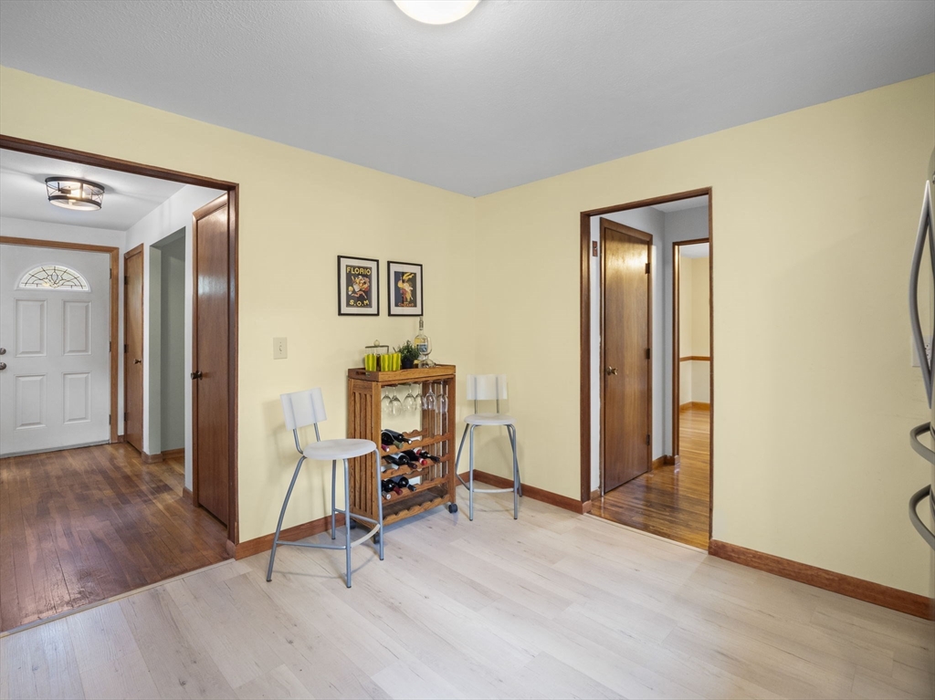 167 Karen Circle Holliston, MA 01746 - Photo 13 of 30 a view of a livingroom with furniture and wooden floor