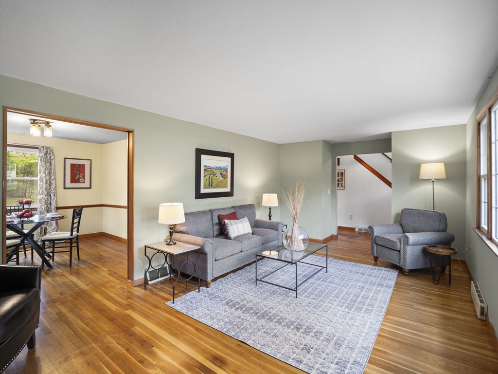 167 Karen Circle Holliston, MA 01746 - Photo 17 of 30 a living room with furniture and wooden floor