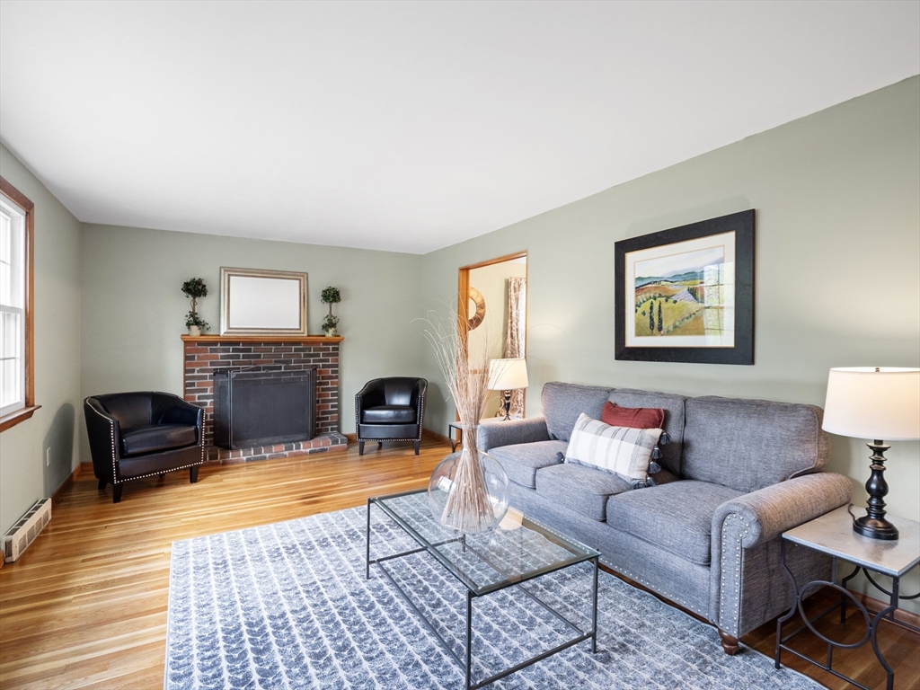 167 Karen Circle Holliston, MA 01746 - Photo 18 of 30 a living room with furniture and a fireplace