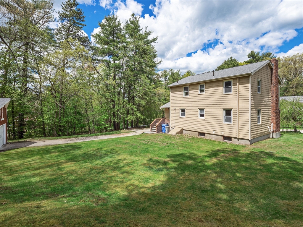 167 Karen Circle Holliston, MA 01746 - Photo 5 of 30 a view of a house with a yard