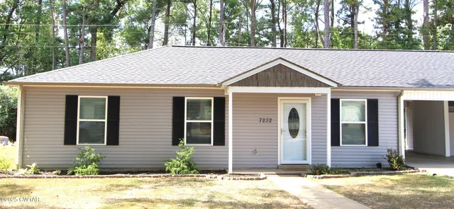 a house view with a outdoor space